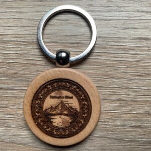 Porte-clé en bois de forme ronde personnalisé avec gravure laser artisanale.